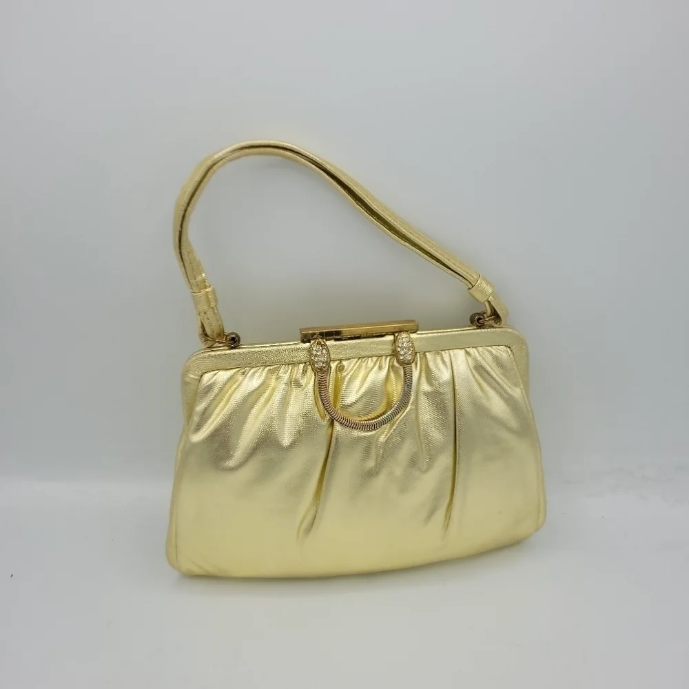 Vintage Andé Gold Clutch With Rhinestone Details Clasp.